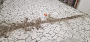 Rost de dilatare in pardoseala de mozaic